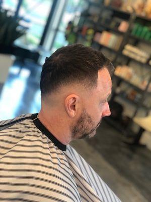 Mid bald fade by Joe.