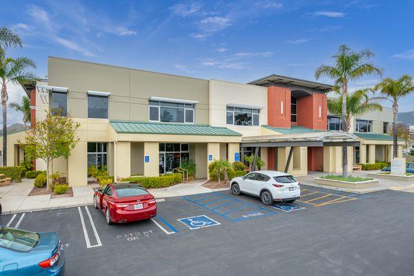 Friendly Smiles Dental San Luis Obispo dentist building entrance and parking.