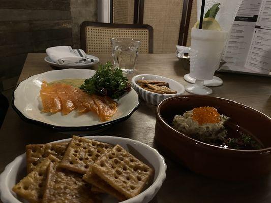 Smoked Whitefish Dip with fried Saltines, Sazerac Cured Salmon, and La Lena cocktail.