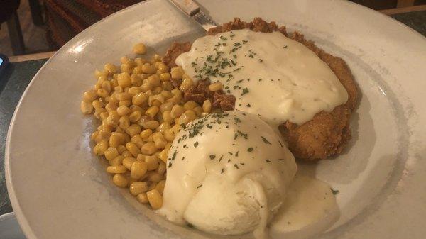 Chicken fried chicken with corn and mashed potatoes