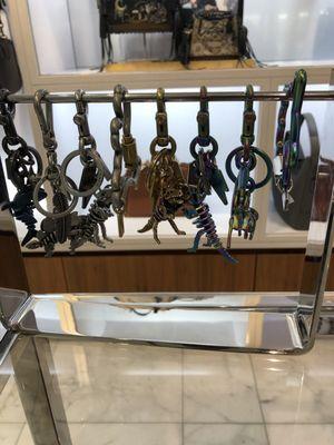 Cool, multicolored dinosaur keychains ($85 to $95 each)