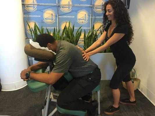 Chair Massage for Golden State Warriors staff during playoffs seasons 2015- 2019