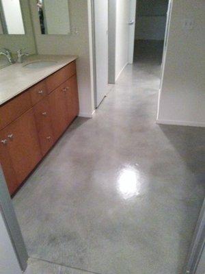 Floor grinded, polished, stained to enhance the concrete grain look.