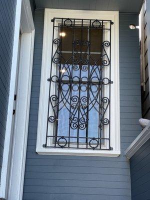 Swirl design, window bar, painted black