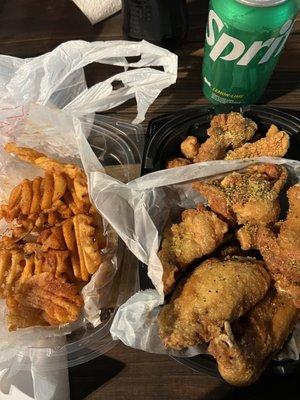 2 Tenders & 6 Wings Meal  Lemon pepper wings  Garlic Parm tenders  Cajun Waffle Fries