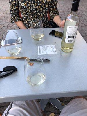 The tables outside with wine