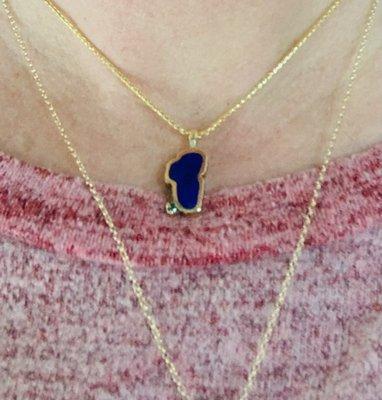 Lapis Lake Tahoe necklace with an emerald for emerald bay and solid gold adjustable chain.