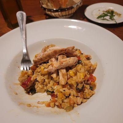 It is a chicken  Risotto with wild vegetables