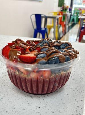 Acai base with strawberry, blueberry and nutella drizzle