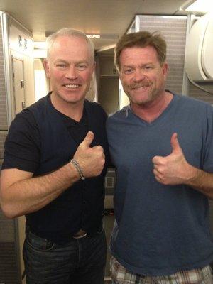 JD and Neal McDonough giving thumbs up to Dickinson Insurance