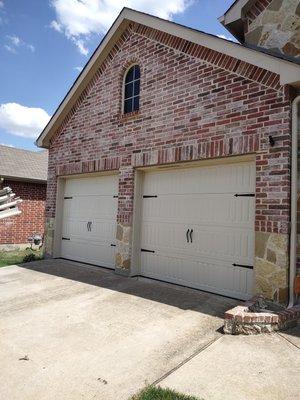 Carriage style metal doors.