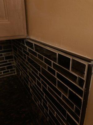 This is the black splash in the kitchen look at the grout lines