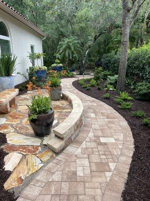 Curving walkway designed by Eden Nursery & installed by Hilimire Pavers, along with our driveway as part of the project.