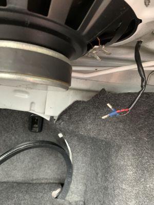 Rear speaker wires disconnected by tech to hide that he blew speaker. "They can't hear the distortion if it's not connected!"