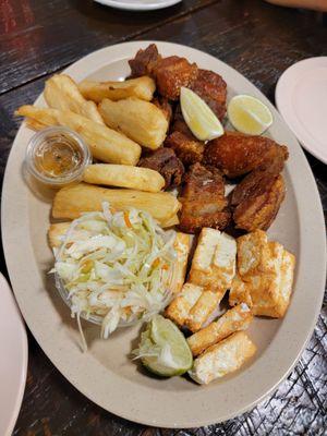 Chicharrón de puerco, yucca fries, fried cheese and curtido!