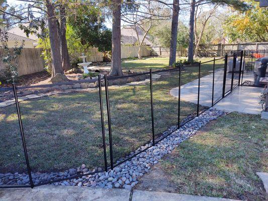 I created a dry creekbed to keep the weed eater away from the fencing and provide some additional landscaping...