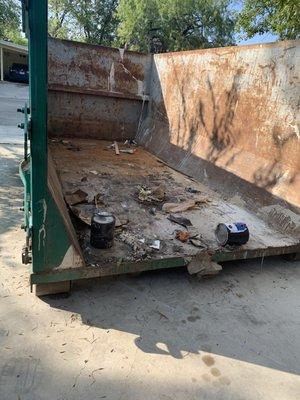 Debris inside dumpster