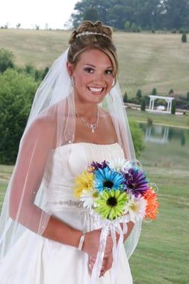 Gorgeous wedding stage for your ceremony as seen here in the back drop of this bride.  We are a great place for engagement photos.