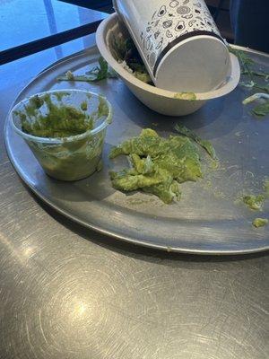 My guacamole cup I paid $3 is half filled with unscoopable guacamole. Oakton VA Chain bridge rd chipotle fix your servings