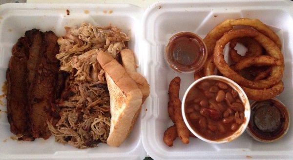 3-meat: brisket, pulled pork, pulled chicken, w/ baked beans, onion rings, and bread.