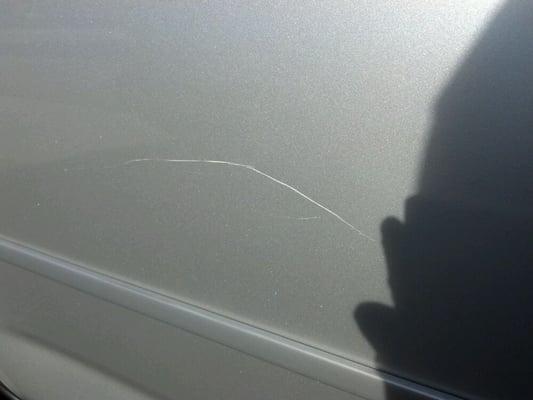 Jerks scratched my car and told me it wasn't their problem.