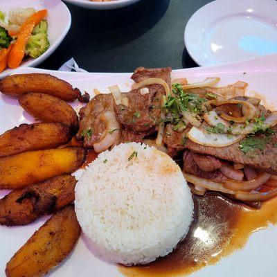 Steak Palomilla, white rice and beans, sweet plantains,