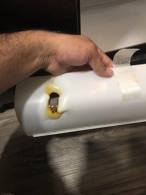 Melted light fixture that was inside of fridge.