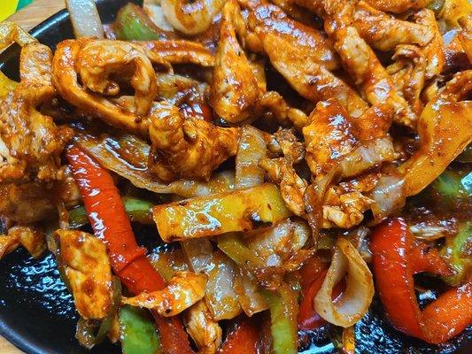 Chicken Fajitas with a Fajita red sauce.