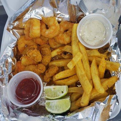 Shrimp, lobster bites,fries and Hush puppies!! Delicious