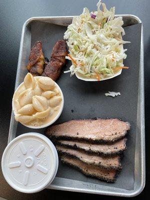 Brisket, gouda mac , jalapeño poppers, coleslaw, banana pudding.