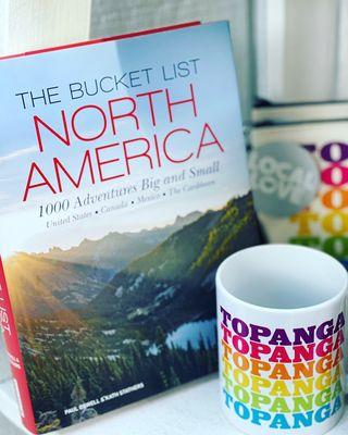 Travel book and Topanga coffee mugs