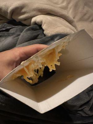 Cheese stuck to box