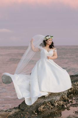 Courtney, standing in the ocean behind me, making sure the dress looks perfect.