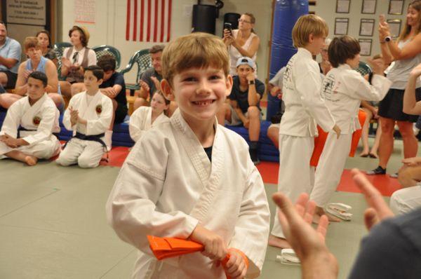 There is nothing better than seeing a child work hard and earn his Karate Belt!