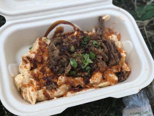 The Brisket Mac w/ Cheddar Cheese, Chipotle Sauce & Green Onions is PHENOMENAL