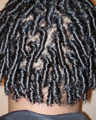 Coils that can be transitioned into locs by Lena at Becca's Hair Salon