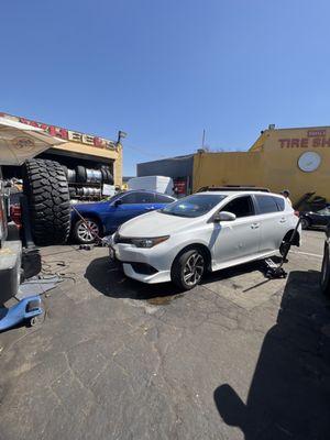 My car getting her shoes fixed