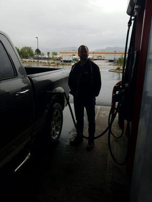 Chris getting gas.