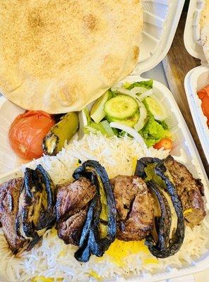 Beef SHISH kabab with grilled tomato, jalapeño, salad and yummy rice with a pita