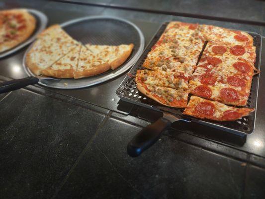 Pizza on the buffet.