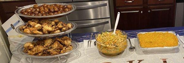 Meatballs, fried chicken, pasta salad, and Mac & cheese