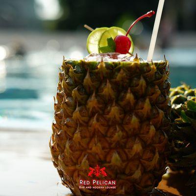 Picture this: A perfect pineapple in one hand, while you feel the relaxing ocean breeze on your face and you are having the best time with y