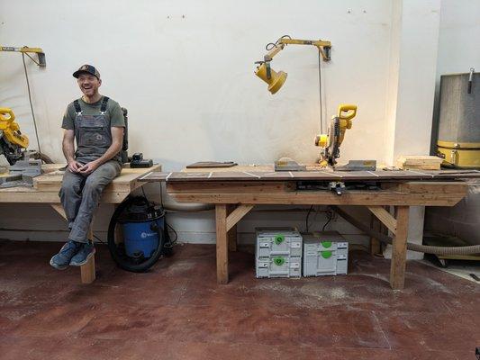 Chris in the workshop with our beautiful wood.