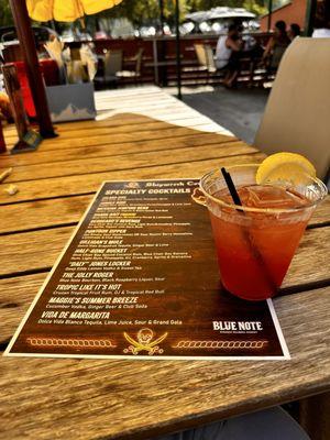 Drink menu pictured with a Jolly Roger