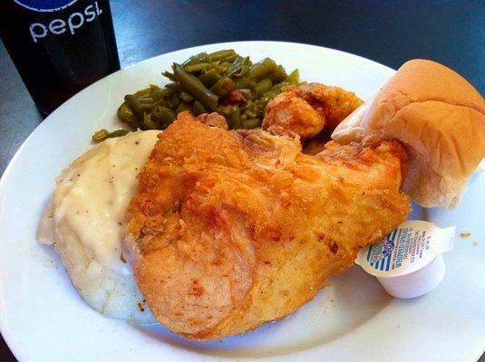 Crispy, tender golden fried chicken: Two piece dinner...Breast and wing, with mashed potatoes & gravy, greenbeans, and roll