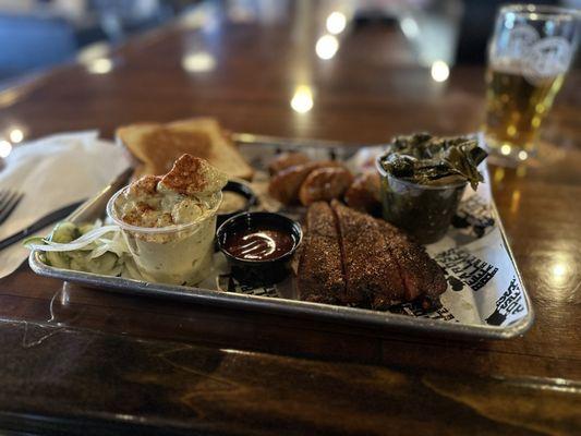 Sausage, ribs, greens, potato salad.