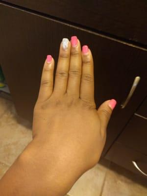 I took this photo 3 WEEKS LATER... My nails grow pretty fast...but the nail tech's work is still in great condition!