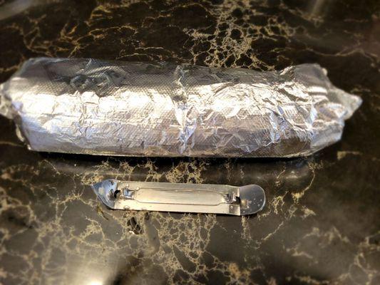 Here is the burrito next to a standard bottle opener. Remember this was 12 bucks!