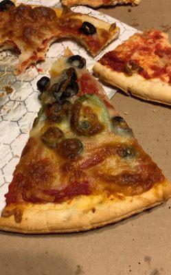 Seamed like a frozen pizza from Walmart and all was added was pepperoni, olives, and jalapeños to it.