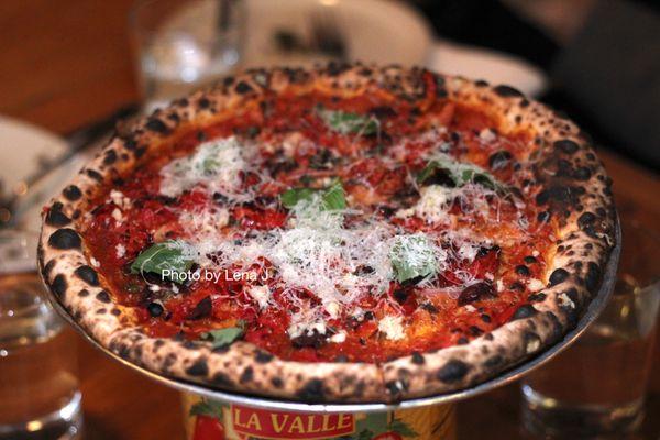 Puttanesca Pizza ($18) - Calabrian chili, oven roasted tomato, olive, red onion, parmesan